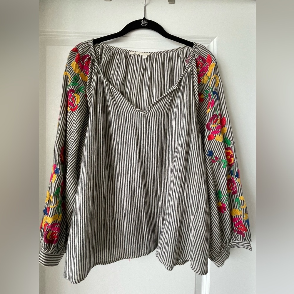 Embroidered top with tassels